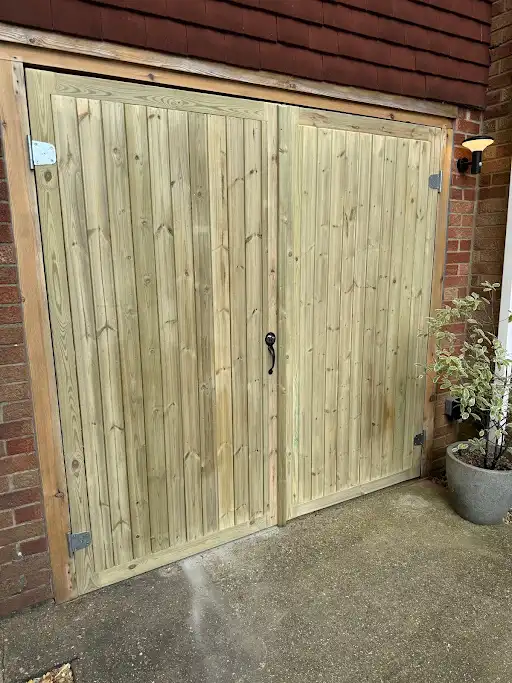 Tall timber side gate with a ring latch