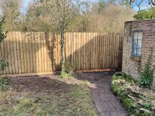 Newly fenced garden cleared and ready for planting